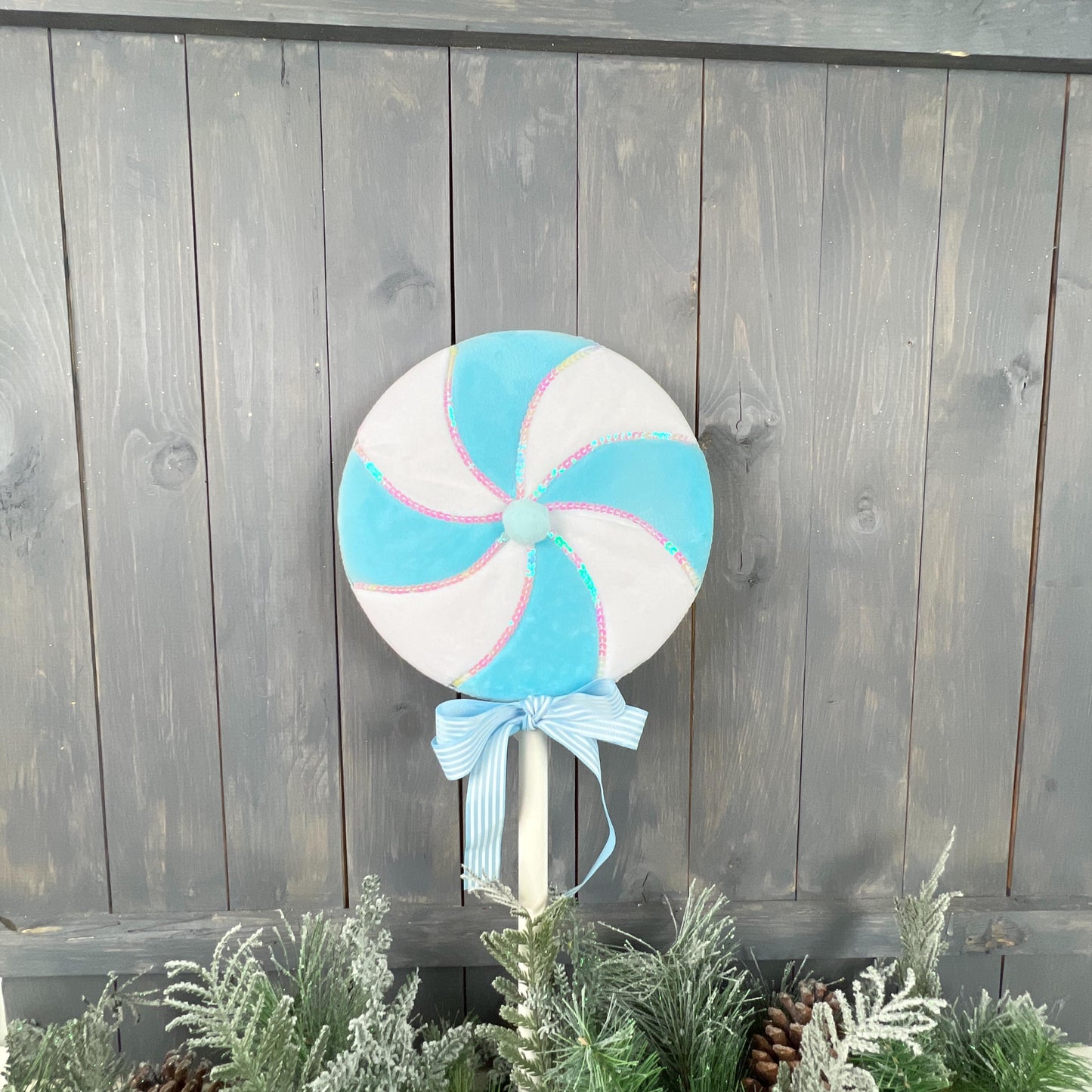 lg blue and white swirl lollipop with sequin trim, perfect for Christmas, party, Easter, or home decor, great photo prop